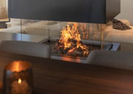 Spezialangefertigte Feuerstelle, mit vier seitiger Feuersicht, Rahmenlose Ausführung.wellflamm_Cheminée_Switzerland_Fireplace